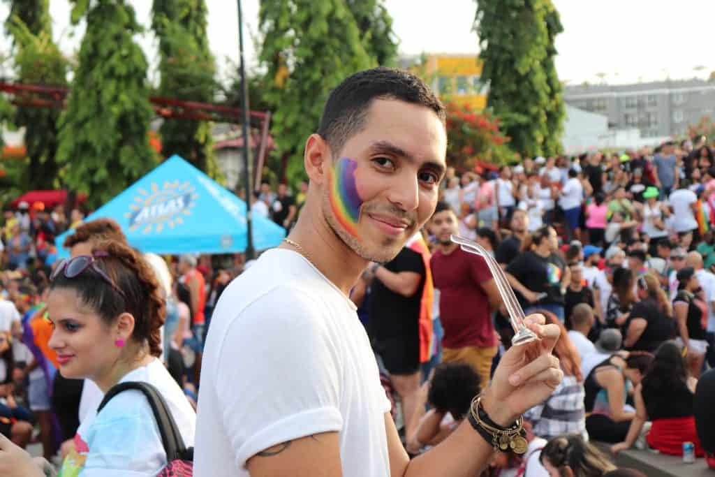 Man smiling at Pride event